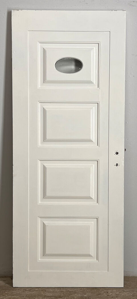 Fyldningsdør med oval rude