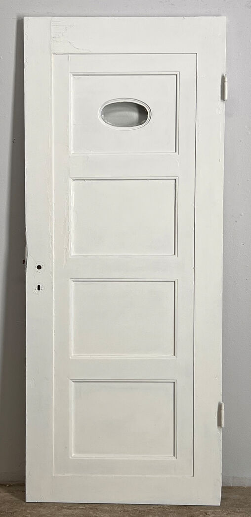 Fyldningsdør med oval rude