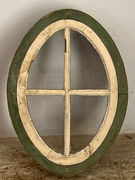 Ovalt vindue med sprosser