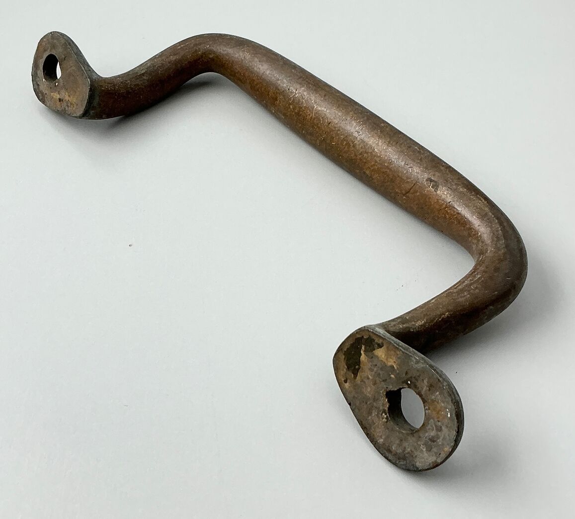 Svingdørshank/greb i massiv messing