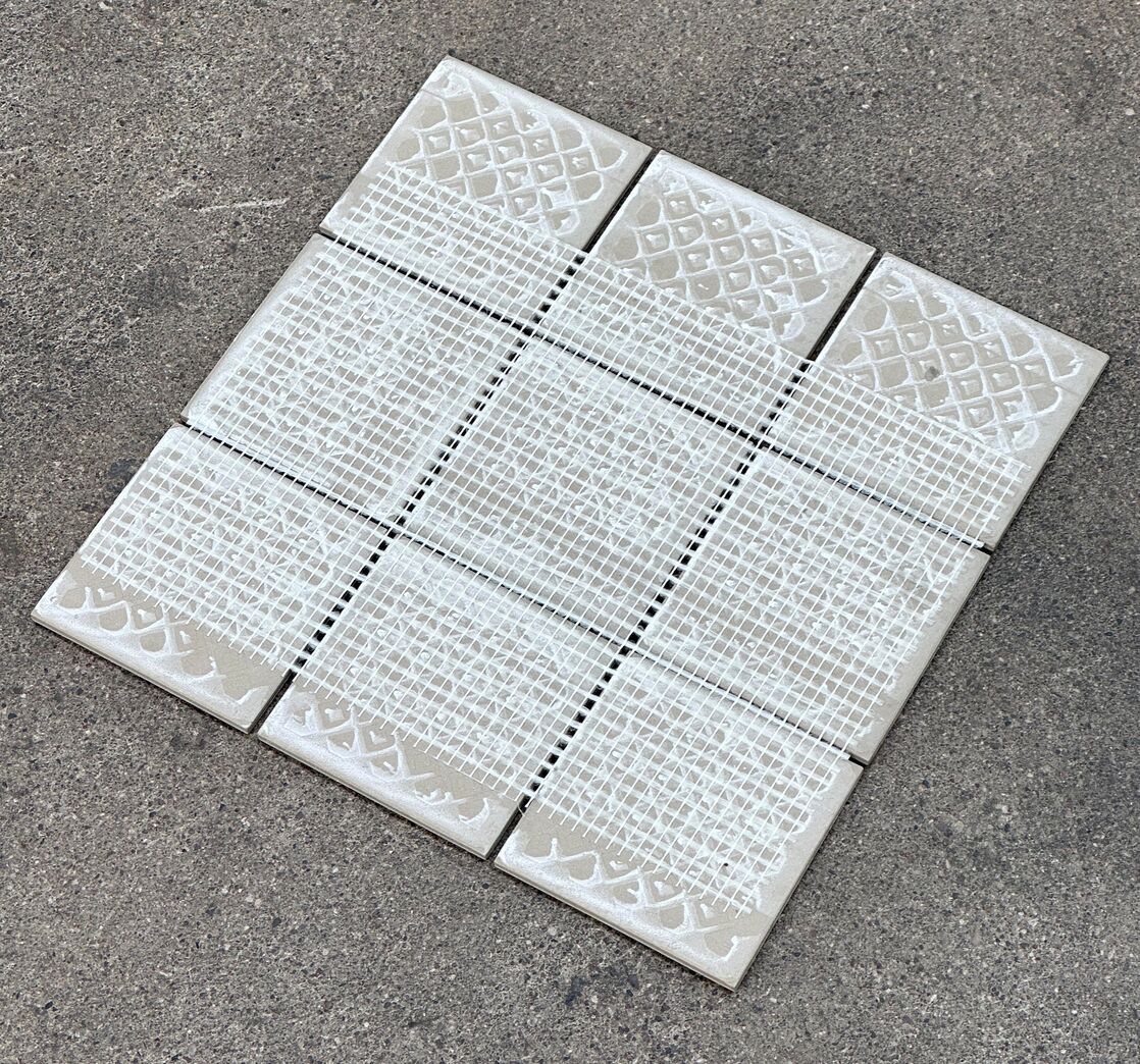 1 m2 grå/hvide vægflise 10x10 cm