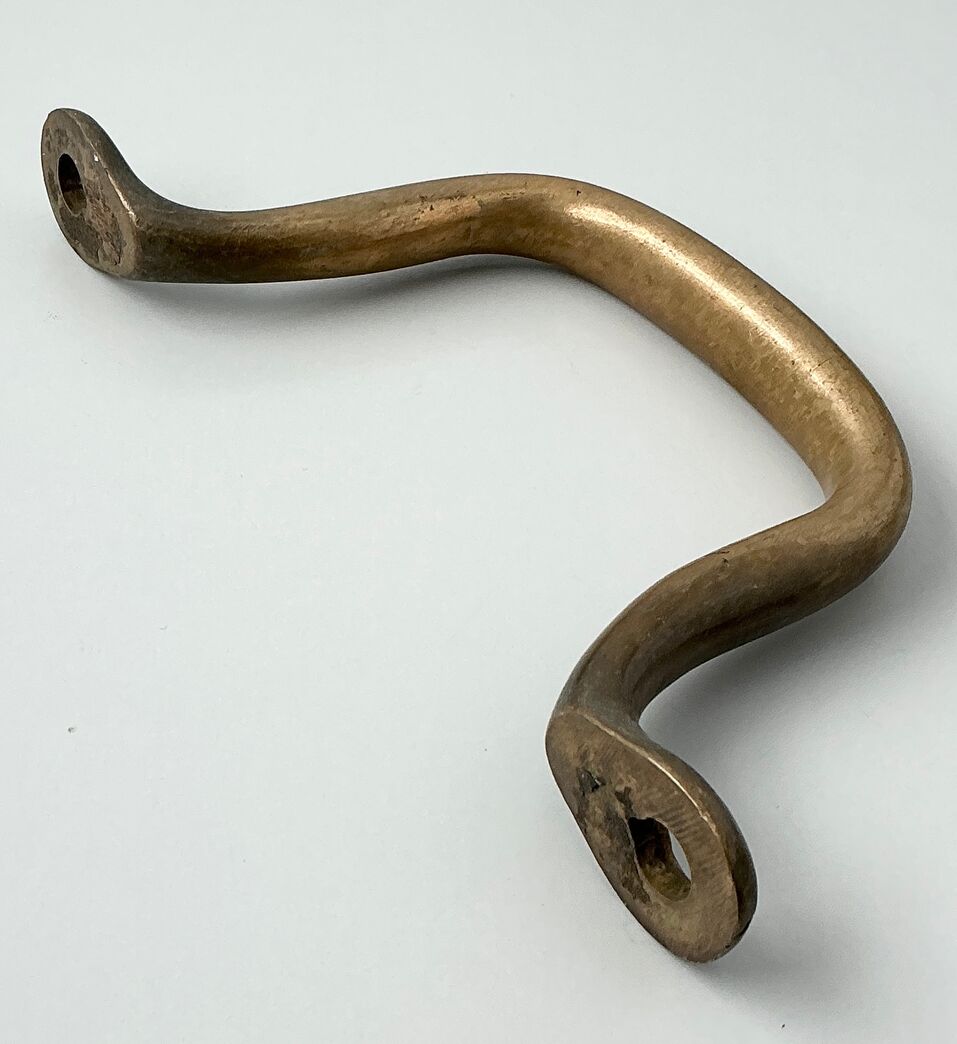Svingdørshank/greb i massiv messing