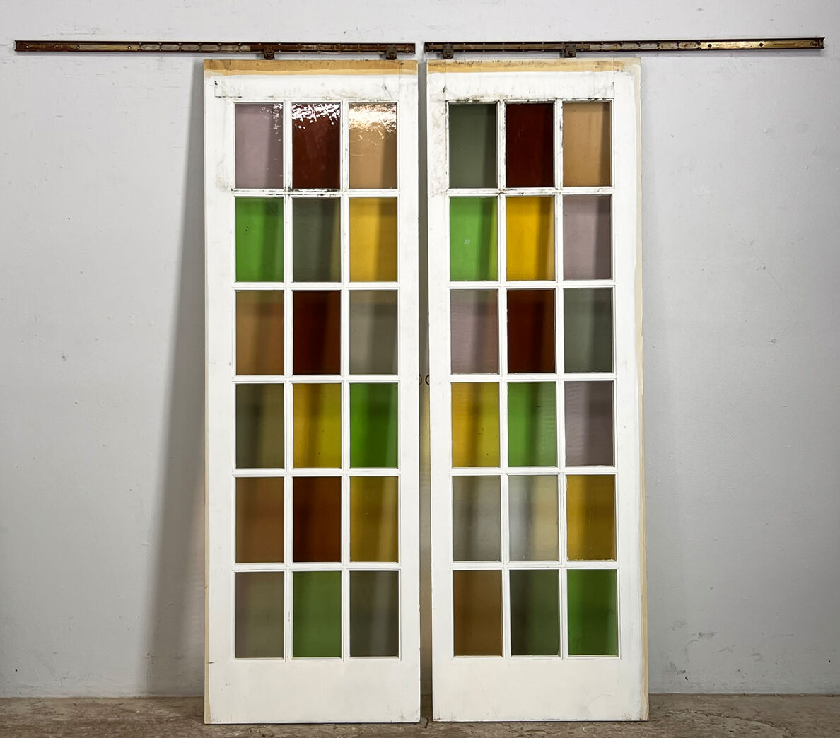 Dobbelt skydedør med skinner