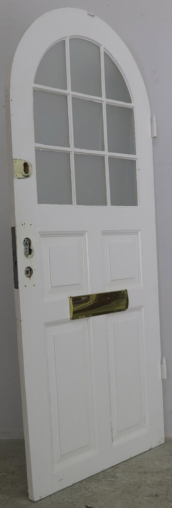 Dør med bue og sprosser