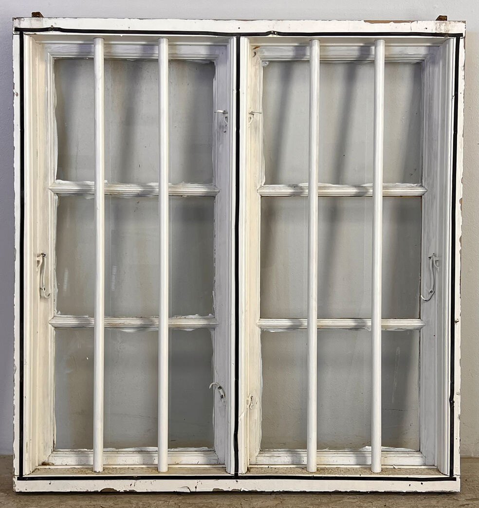 Sprossevindue med tremmer